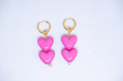 Huggie Corazones Rosas